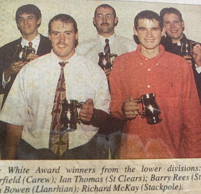 Ian (second left) winning an Ocky White award for his cricket performances